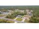 This aerial view highlights the home's position in the neighborhood, featuring a long driveway at 3125 Sw 172Nd Lane Rd, Ocala, FL 34473