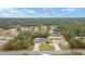 This aerial view highlights the home's position in the neighborhood, featuring a long driveway at 3125 Sw 172Nd Lane Rd, Ocala, FL 34473