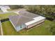 This is an aerial view of the roof, backyard, and screened in patio at 3125 Sw 172Nd Lane Rd, Ocala, FL 34473