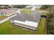 This is an aerial view of the roof, backyard, and screened in patio at 3125 Sw 172Nd Lane Rd, Ocala, FL 34473