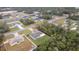 This aerial view highlights the home's position in the neighborhood, featuring a long driveway at 3125 Sw 172Nd Lane Rd, Ocala, FL 34473