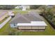 This is an aerial view of the roof, backyard, and screened in patio at 3125 Sw 172Nd Lane Rd, Ocala, FL 34473