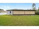 This is a view of the backyard and extended screened in patio at 3125 Sw 172Nd Lane Rd, Ocala, FL 34473