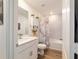 Bathroom featuring wood-look flooring, a single sink vanity, and a bathtub with shower at 3125 Sw 172Nd Lane Rd, Ocala, FL 34473