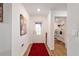 Hallway with access to laundry room, showcasing modern appliances and additional storage space at 3125 Sw 172Nd Lane Rd, Ocala, FL 34473