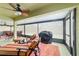 Relaxing screened patio with comfortable lounge chairs and an inviting outdoor space at 3125 Sw 172Nd Lane Rd, Ocala, FL 34473