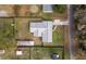 Overhead shot of a home featuring a well-maintained roof and a spacious backyard at 3204 Ne 16Th Ave, Ocala, FL 34479