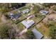 Aerial shot of the home with well-maintained yard, detached garage, and neighborhood setting at 3204 Ne 16Th Ave, Ocala, FL 34479