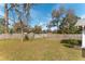 Large fenced backyard with mature trees provides privacy at 3204 Ne 16Th Ave, Ocala, FL 34479