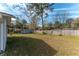 Large backyard with a privacy fence and mature trees at 3204 Ne 16Th Ave, Ocala, FL 34479