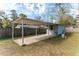 Outdoor carport and shed at the back of the house at 3204 Ne 16Th Ave, Ocala, FL 34479