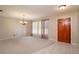 Inviting living room with carpet floors and natural light at 3204 Ne 16Th Ave, Ocala, FL 34479