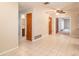 Bright living room featuring tile floors and a view into other rooms of the house at 3204 Ne 16Th Ave, Ocala, FL 34479