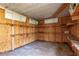 Interior view of a shed or workshop featuring exposed wood and built-in shelving at 3204 Ne 16Th Ave, Ocala, FL 34479