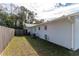 A view of the side yard, showing the home's exterior at 3204 Ne 16Th Ave, Ocala, FL 34479