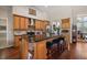 Kitchen island with granite countertops and barstool seating offers a modern gathering spot at 3401 Se 49Th Ave, Ocala, FL 34480