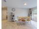 Dining room features a table, six chairs, and tile flooring at 3832 Se 2Nd St, Ocala, FL 34471