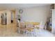 Dining room features a table, six chairs, and tile flooring at 3832 Se 2Nd St, Ocala, FL 34471