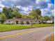 Charming single story home featuring well-manicured lawn and inviting front porch area at 3832 Se 2Nd St, Ocala, FL 34471