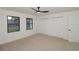 Cozy bedroom featuring a ceiling fan and a view out to the home's backyard at 4534 Se 13Th St, Ocala, FL 34471