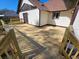 New wooden deck with railings, providing an inviting outdoor living space perfect for entertaining or relaxation at 4534 Se 13Th St, Ocala, FL 34471