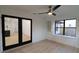 Bright living room with new floors and a black framed glass door at 4534 Se 13Th St, Ocala, FL 34471