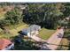 Aerial view of a well-kept single story house with a manicured lawn at 480 Nw 55Th Ave, Ocala, FL 34482