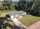 Bird's eye view of a beautifully maintained house with manicured lawn at 480 Nw 55Th Ave, Ocala, FL 34482