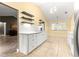 Bright kitchen featuring white cabinetry, modern appliances, and a functional layout at 5115 Se 20Th St, Ocala, FL 34480