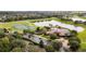 Scenic aerial view of community clubhouse, playground, and sports fields at 5464 Sw 41St St, Ocala, FL 34474