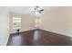 This bedroom features wood flooring and a bright window allowing for natural light at 5464 Sw 41St St, Ocala, FL 34474