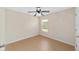 Bedroom featuring a ceiling fan and natural light from the window at 5464 Sw 41St St, Ocala, FL 34474