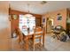 A cozy dining room features neutral tones and light tile flooring at 5812 Luzon Pl, Orlando, FL 32839