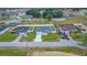 An aerial view of the property highlighting its landscaping and neighborhood at 6 Dogwood Loop Ave, Ocala, FL 34472