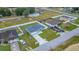 The aerial shot displays the property's fencing, landscaping, and ample parking space at 6 Dogwood Loop Ave, Ocala, FL 34472