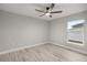 This is a bedroom with a ceiling fan and a window at 6 Dogwood Loop Ave, Ocala, FL 34472