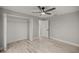 This is a bedroom with a closet and a ceiling fan at 6 Dogwood Loop Ave, Ocala, FL 34472