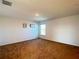 Spacious bedroom featuring plush carpet flooring, neutral paint, and a bright window at 6320 Sw 74Th Terrace Rd, Ocala, FL 34474