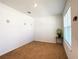 Empty bedroom featuring neutral carpeting, ample natural light from the window, and minimalistic decor at 6320 Sw 74Th Terrace Rd, Ocala, FL 34474