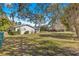 A cozy one-story home with a spacious yard and mature trees at 8126 Sw 105Th Pl, Ocala, FL 34481