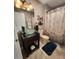 Bathroom featuring a glass bowl sink on a dark wood vanity at 8585 Nw 162Nd Ct, Morriston, FL 32668