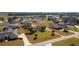 Aerial view of the home and surrounding lot including the grass landing strip at 8947 Se 70Th Ter, Ocala, FL 34472