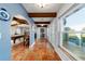 Bright foyer with tile flooring offering views of the living spaces and backyard at 8947 Se 70Th Ter, Ocala, FL 34472