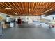 Large open space with high ceilings, abundant lighting, and ample storage, perfect for aircraft storage and maintenance at 8947 Se 70Th Ter, Ocala, FL 34472