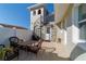 Outdoor patio with a seating area and a spiral staircase leading to an upper level at 8947 Se 70Th Ter, Ocala, FL 34472