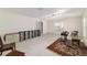 Large open room with modern lighting and neutral carpeting at 905 Se 12Th St, Ocala, FL 34471