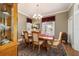 Well-lit dining room with classic decor and hardwood floors at 905 Se 12Th St, Ocala, FL 34471