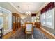 Traditional dining room with chandelier and hardwood floors at 905 Se 12Th St, Ocala, FL 34471