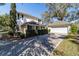 Charming two-story home with detached garage and beautiful brick driveway at 905 Se 12Th St, Ocala, FL 34471