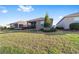 Expansive lawn featuring lush green grass and meticulous landscaping at 9839 Sw 99Th Loop, Ocala, FL 34481